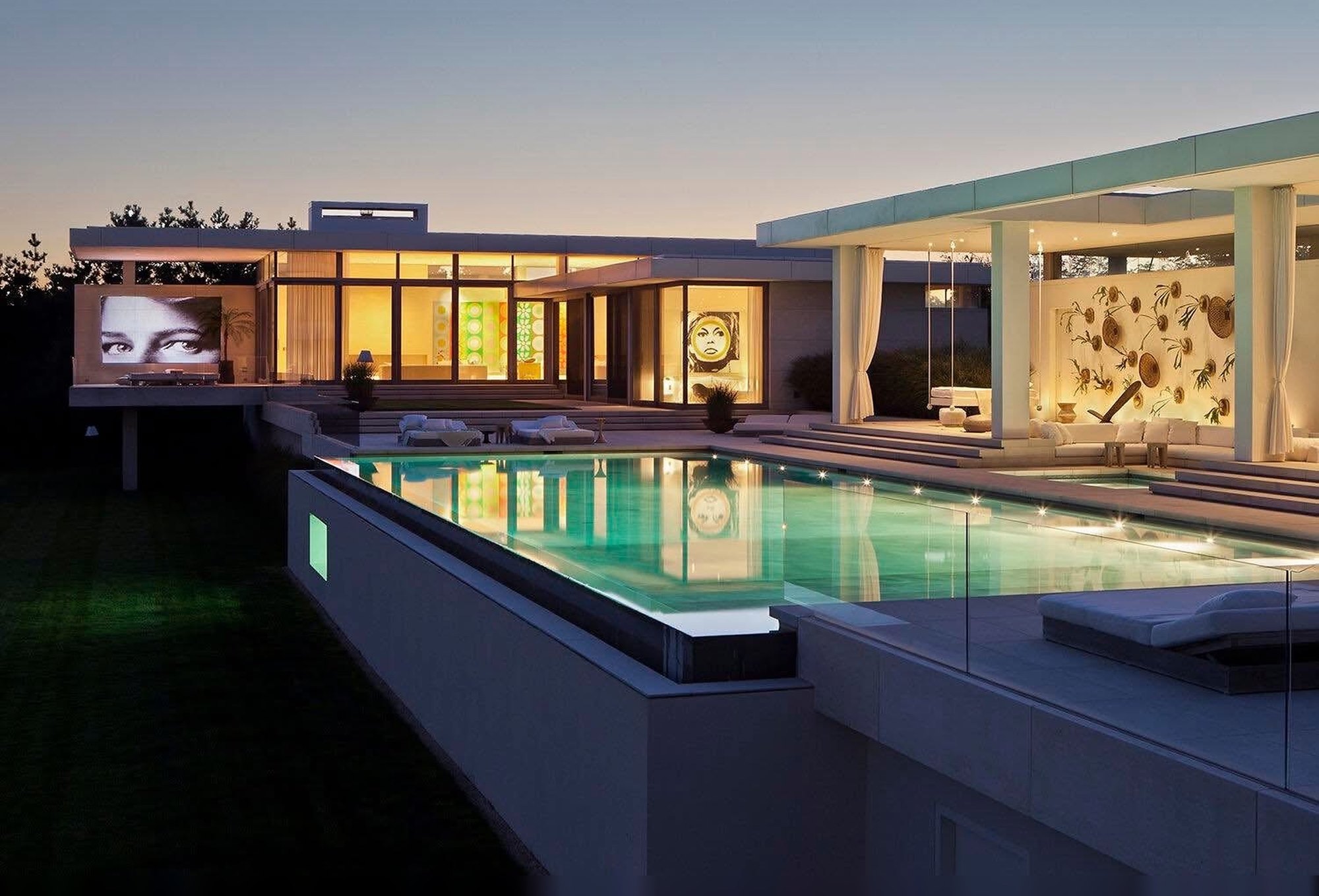 Modern pool house terrace at twilight